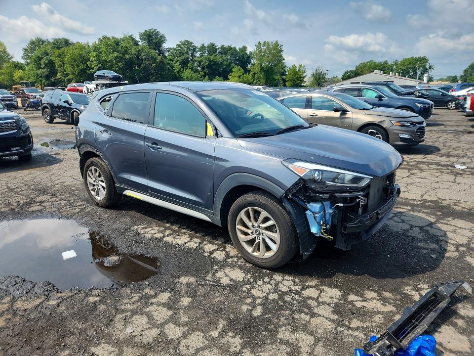 Photo 4 from auction – 2017 HYUNDAI TUCSON with VIN KM8J3CA44HU495396