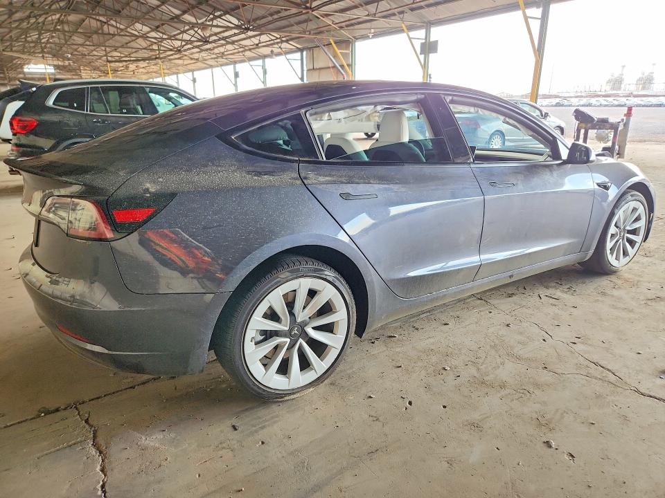 Снимка 3 от търг – 2023 TESLA MODEL 3 с VIN 5YJ3E1EA8PF551228