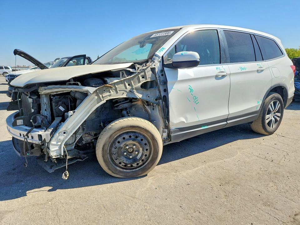 HONDA PILOT 2017 with VIN 5FNYF5H57HB029992 - Photo from auction