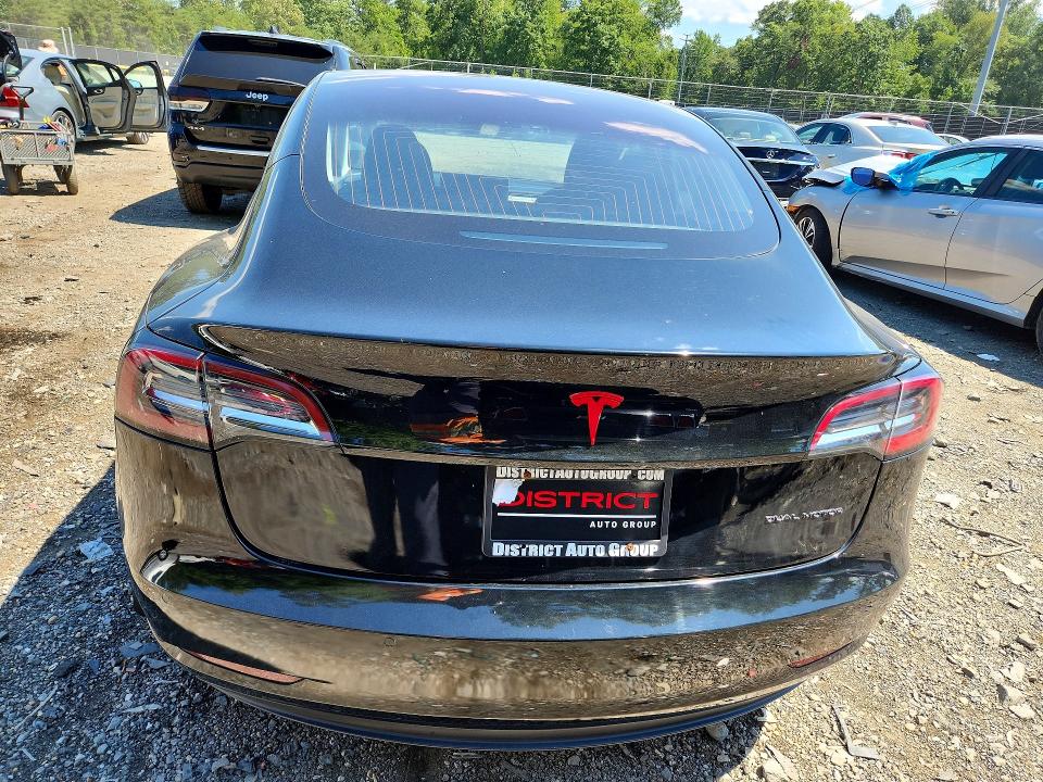 Photo 6 from auction – 2018 TESLA MODEL 3 with VIN 5YJ3E1EB6JF128082
