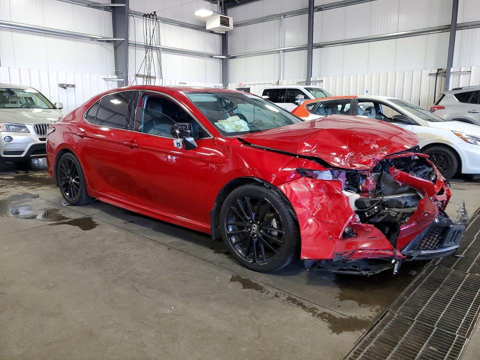Photo 4 from auction – 2023 TOYOTA CAMRY with VIN 4T1K31AK0PU059313