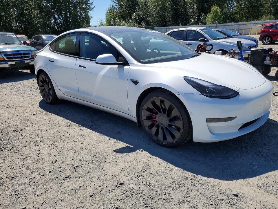 Photo 4 from auction – 2022 TESLA MODEL 3 with VIN 5YJ3E1EC9NF293509