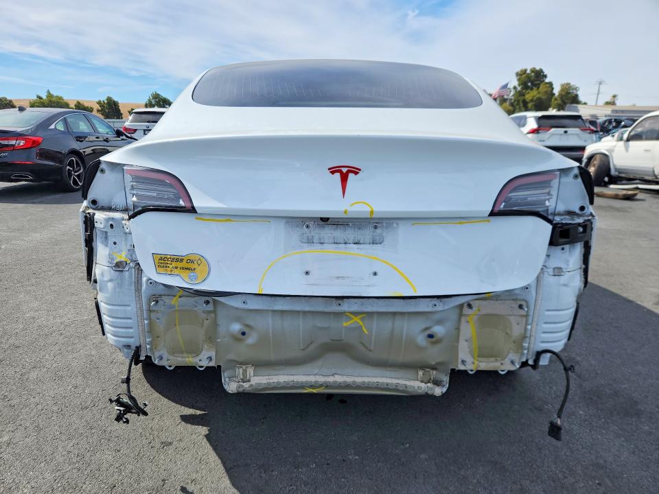 Photo 6 from auction – 2018 TESLA MODEL 3 with VIN 5YJ3E1EA0JF062569