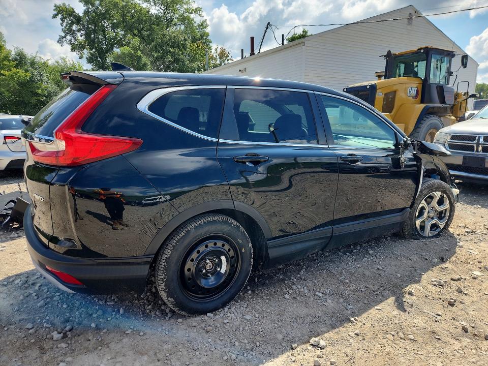 Photo 3 from auction – 2018 HONDA CR-V with VIN 2HKRW2H59JH601896