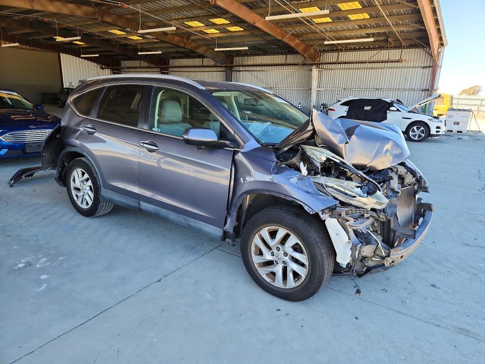 Photo 4 from auction – 2016 HONDA CR-V with VIN 5J6RM3H70GL023442