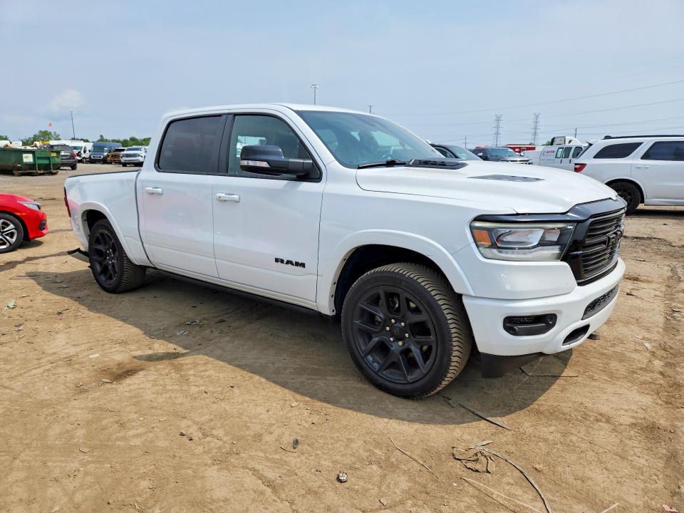 Photo 4 from auction – 2021 RAM 1500 with VIN 1C6RRFJG2MN836324