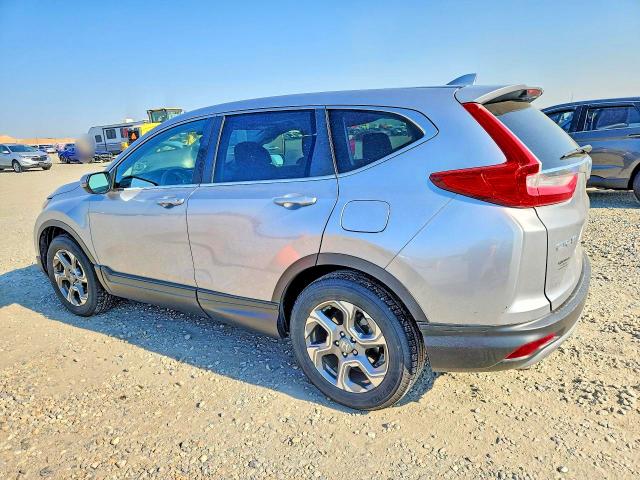 Photo 2 from auction – 2017 HONDA CR-V with VIN 2HKRW2H57HH676395