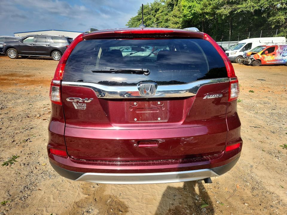 Photo 6 from auction – 2016 HONDA CR-V with VIN 5J6RM4H76GL133630