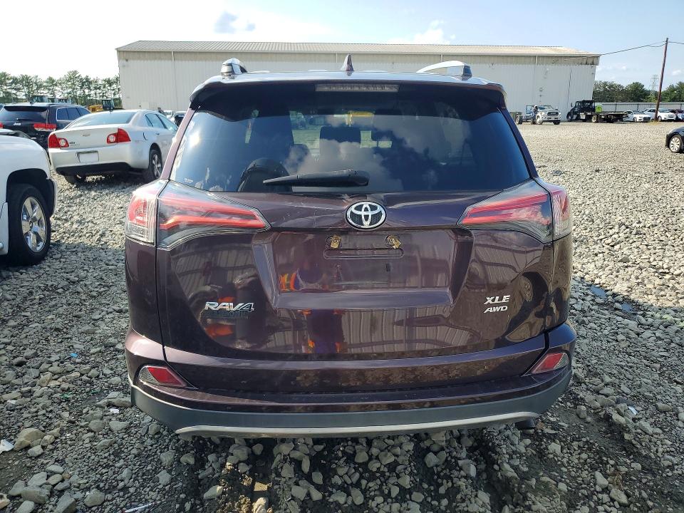 Photo 6 from auction – 2018 TOYOTA RAV4 with VIN 2T3RFREV2JW778618