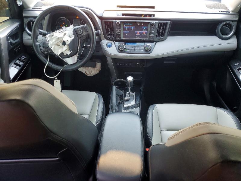 Снимка 8 от търг – 2018 TOYOTA RAV4 HV с VIN JTMDJREV9JD187840