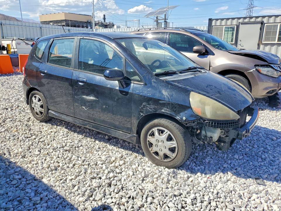 Photo 4 from auction – 2007 HONDA FIT with VIN JHMGD37637S004393