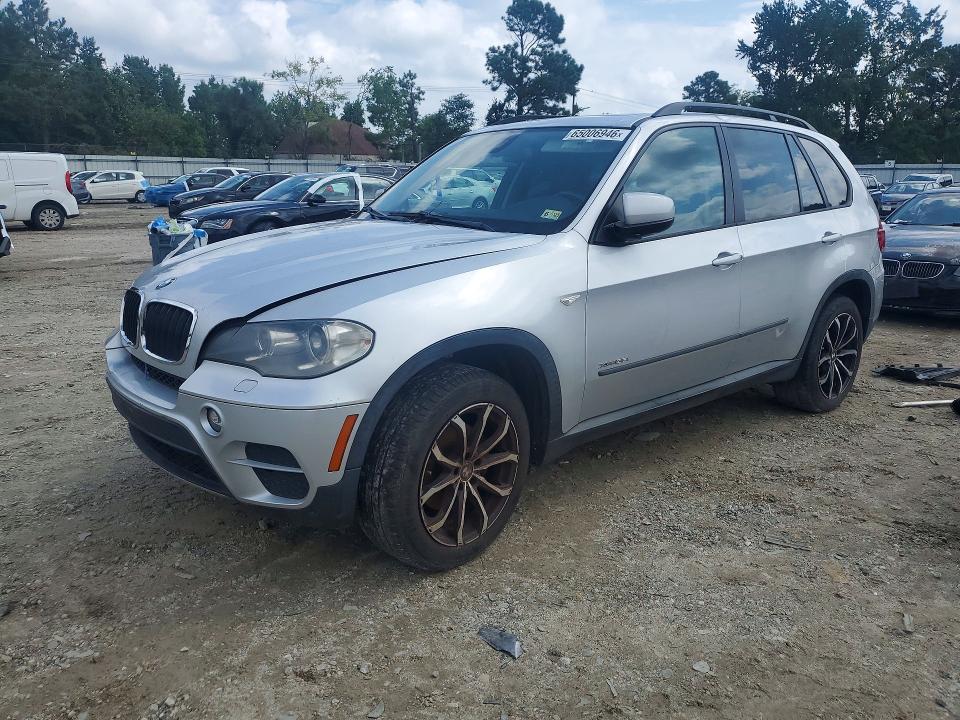 BMW X5 2013 with VIN 5UXZV4C59D0B01570 - Photo from auction