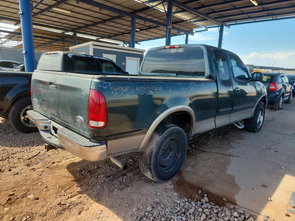 Photo 3 from auction – 2001 FORD F150 with VIN 1FTRX18LX1NA70097