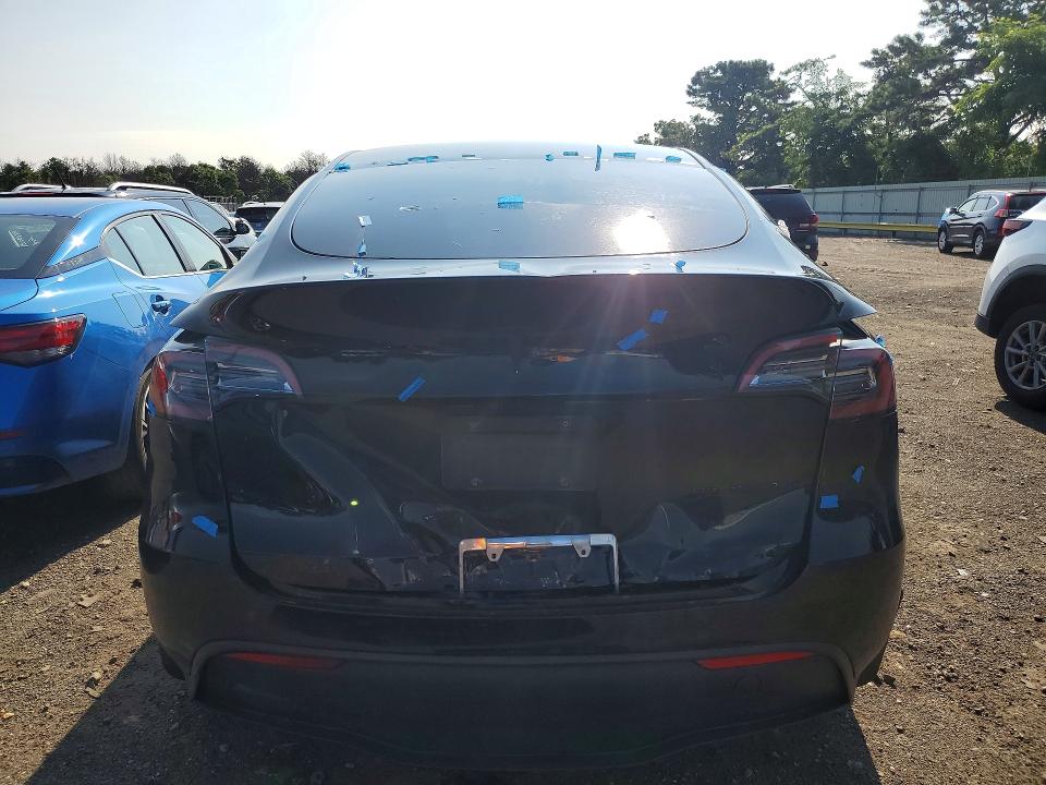 Photo 6 from auction – 2021 TESLA MODEL Y with VIN 5YJYGDEE6MF143052