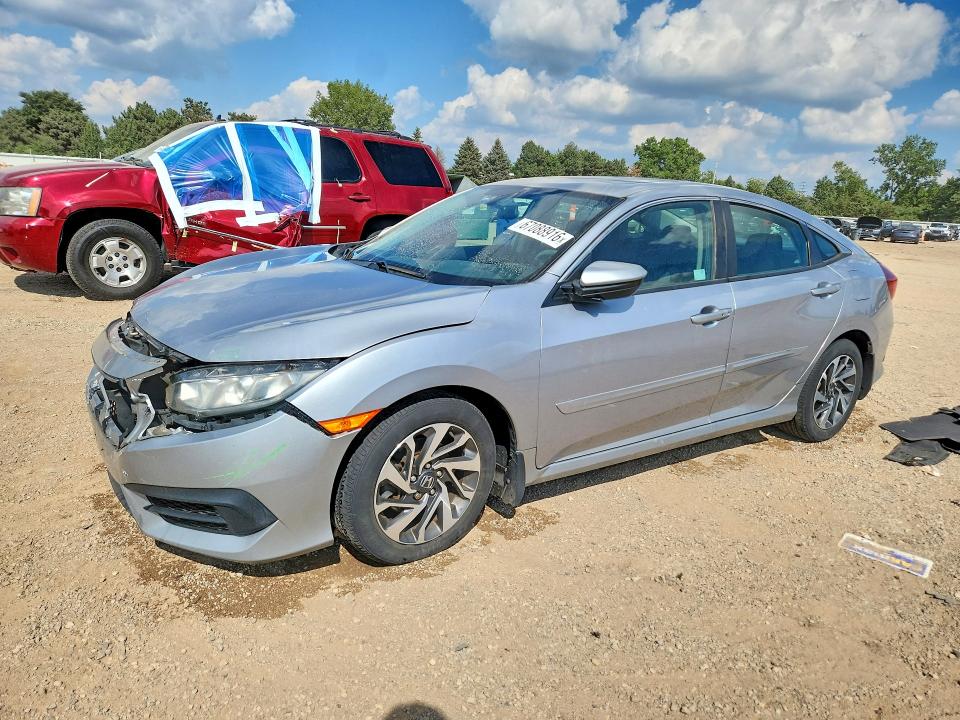 HONDA CIVIC 2016 with VIN 19XFC2F72GE051549 - Photo from auction