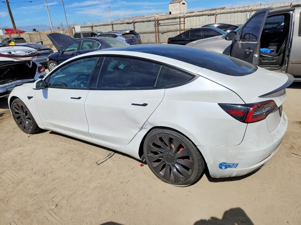 Photo 2 from auction – 2021 TESLA MODEL 3 with VIN 5YJ3E1EC1MF935929