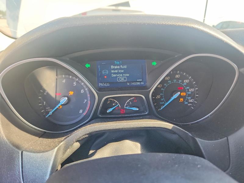 Photo 9 from auction – 2014 FORD FOCUS with VIN 1FADP3K23EL213047