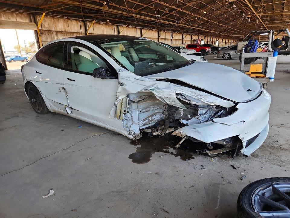Photo 4 from auction – 2022 TESLA MODEL 3 with VIN 5YJ3E1EB5NF351610