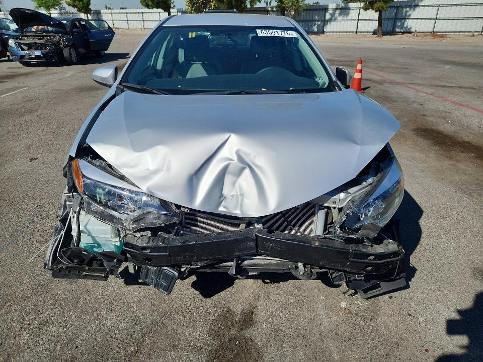 Photo 5 from auction – 2015 TOYOTA COROLLA with VIN 5YFBURHE2FP340945