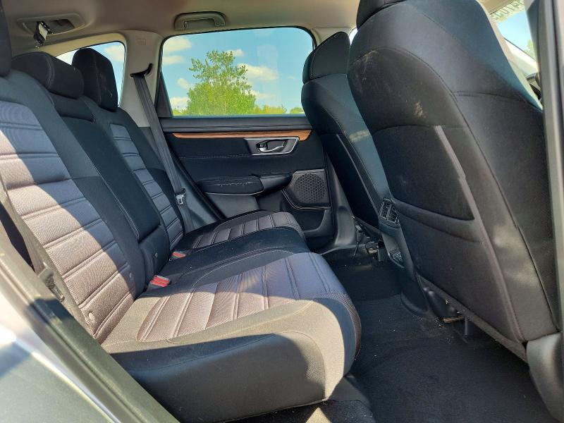 Photo 11 from auction – 2018 HONDA CR-V with VIN 7FARW2H57JE009321