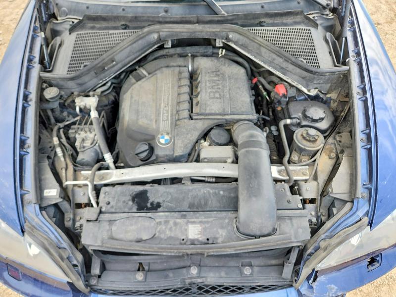 Photo 11 from auction – 2013 BMW X5 with VIN 5UXZV4C54D0E02571