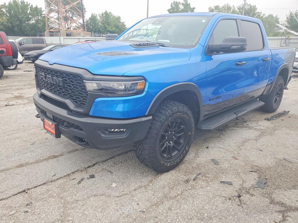 RAM 1500 2025 with VIN 1C6SRFLP0SN593799 - Photo from auction
