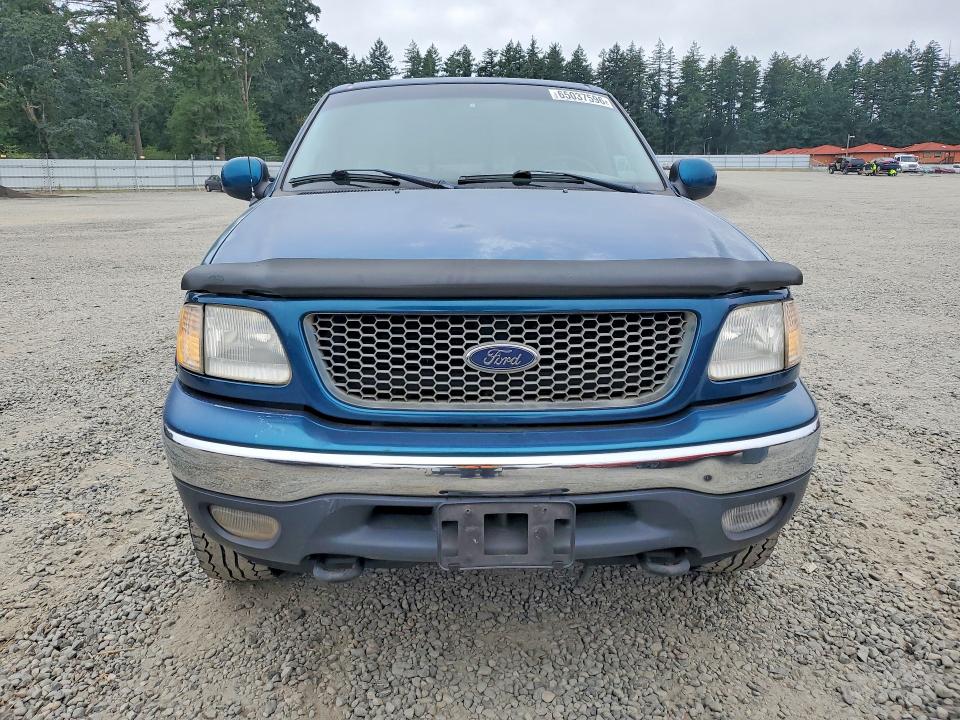 Photo 5 from auction – 2000 FORD F150 with VIN 2FTRX18L4YCB12022