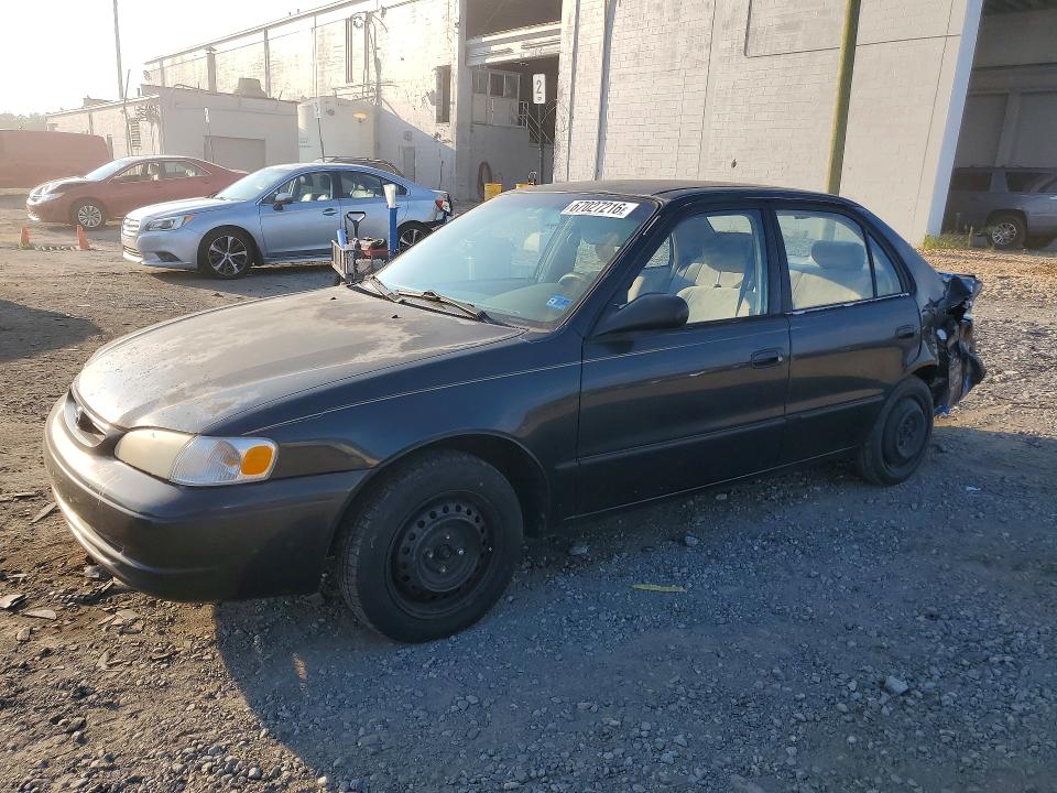 TOYOTA COROLLA 1999 with VIN 2T1BR12E3XC179020 - Photo from auction