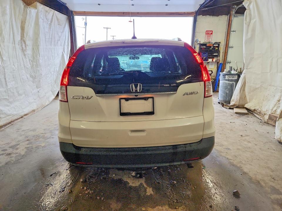 Photo 6 from auction – 2012 HONDA CR-V with VIN 5J6RM4H75CL037272