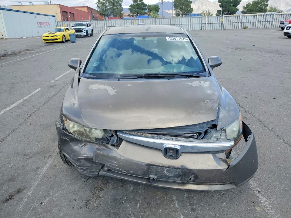 Photo 5 from auction – 2006 HONDA CIVIC with VIN JHMFA16506S000284