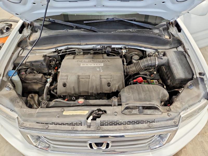 Photo 12 from auction – 2012 HONDA RIDGELINE with VIN 5FPYK1F52CB001699