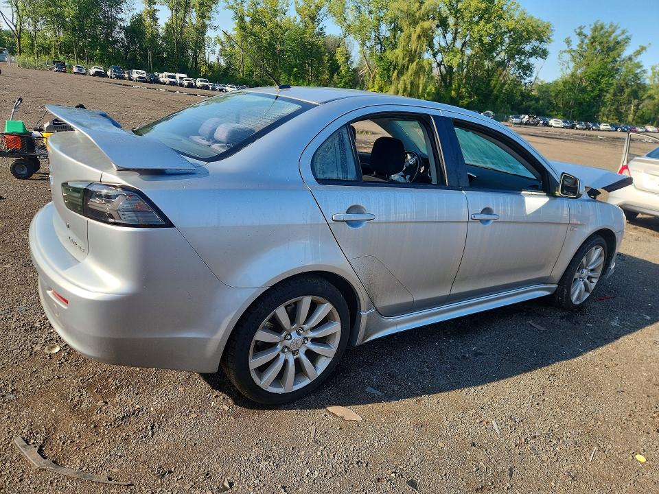 Photo 3 from auction – 2009 MITSUBISHI LANCER with VIN JA3AU86W59U023183