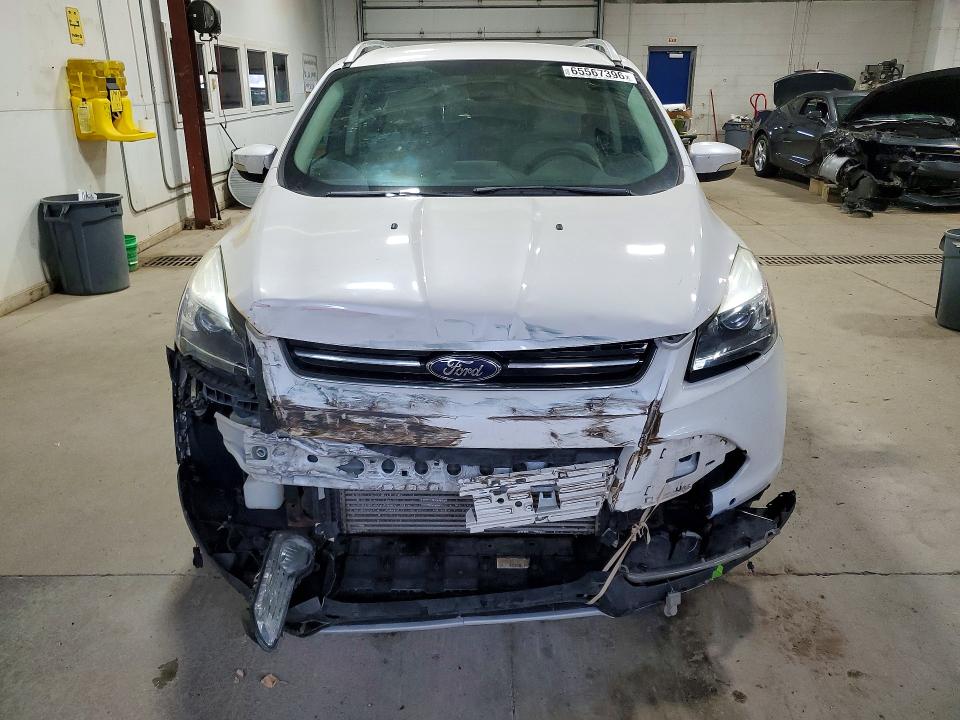 Photo 5 from auction – 2014 FORD ESCAPE with VIN 1FMCU9J93EUB43779