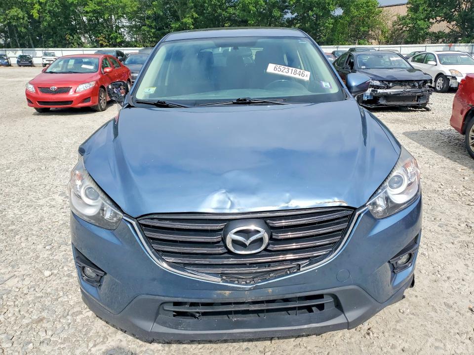 Photo 5 from auction – 2016 MAZDA CX-5 with VIN JM3KE4CY5G0859976