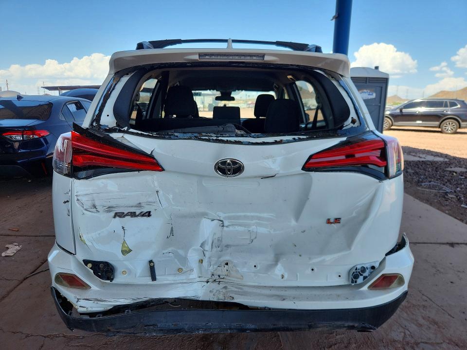 Photo 6 from auction – 2018 TOYOTA RAV4 with VIN JTMZFREV7JJ732572