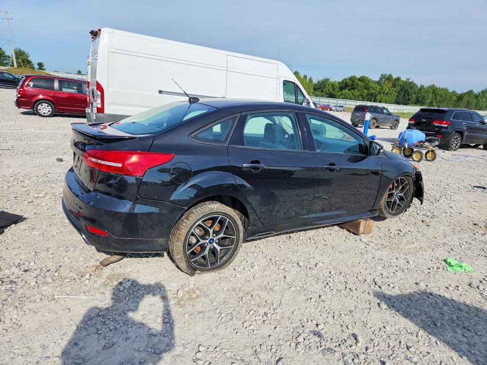 Photo 3 from auction – 2015 FORD FOCUS with VIN 1FADP3F28FL386588