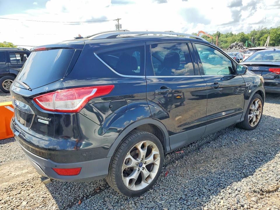 Photo 3 from auction – 2014 FORD ESCAPE with VIN 1FMCU0J99EUA57033