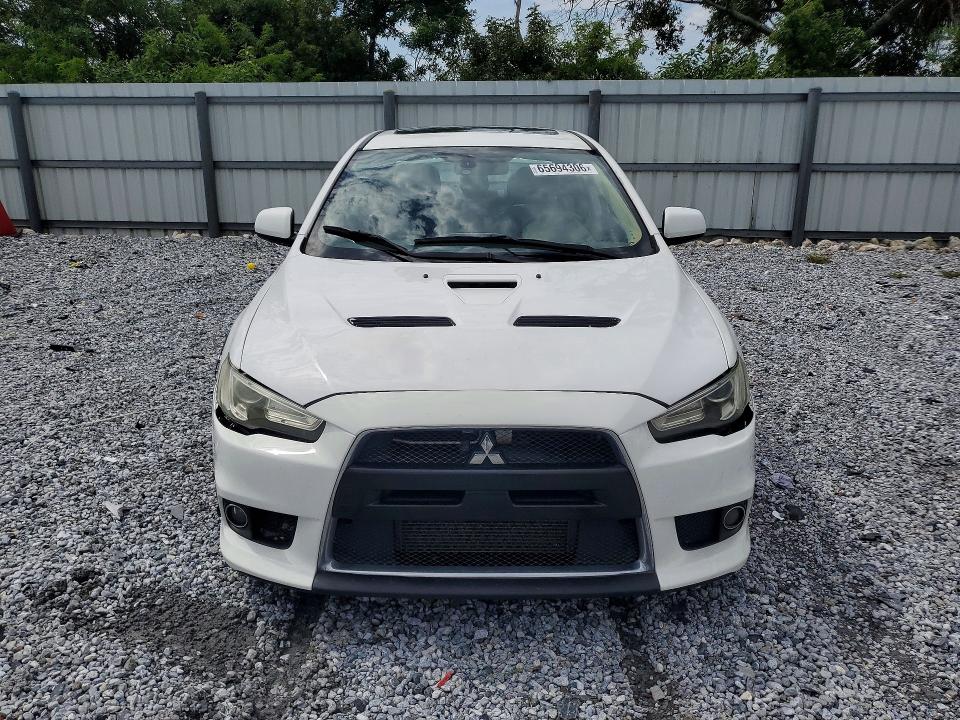 Photo 5 from auction – 2013 MITSUBISHI LANCER with VIN JA32W5FV2DU011733