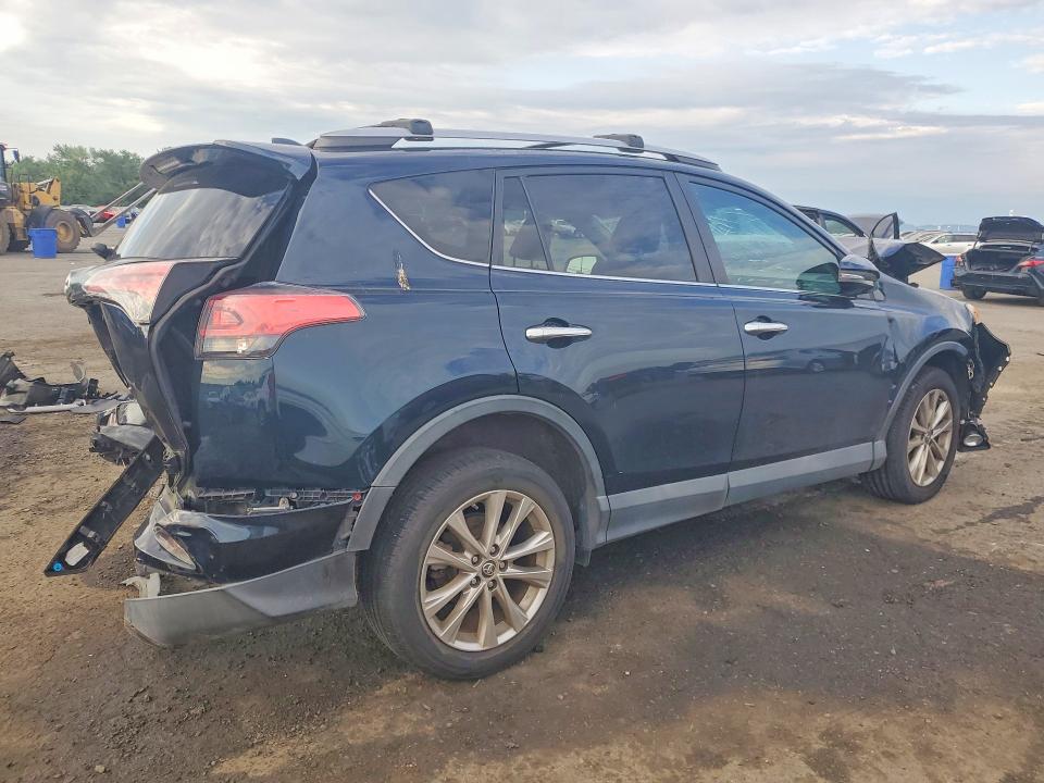 Photo 3 from auction – 2018 TOYOTA RAV4 with VIN 2T3DFREV9JW746274