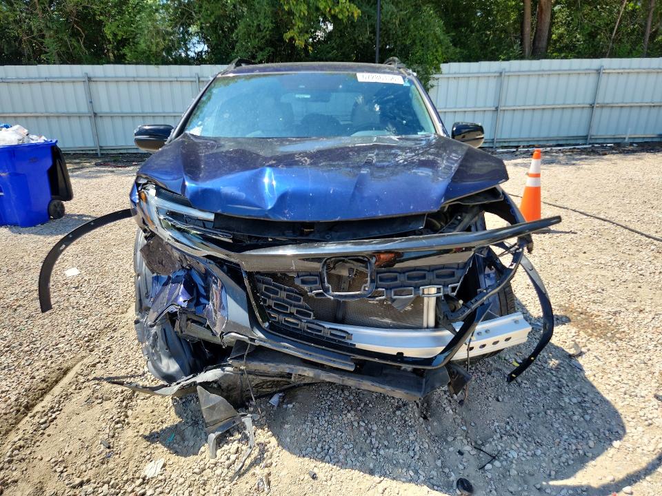 Photo 5 from auction – 2021 HONDA PASSPORT with VIN 5FNYF8H92MB036038