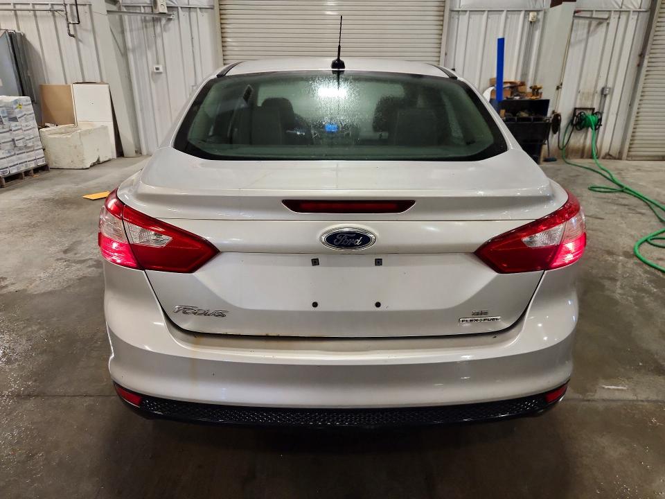 Photo 6 from auction – 2014 FORD FOCUS with VIN 1FADP3F25EL142461