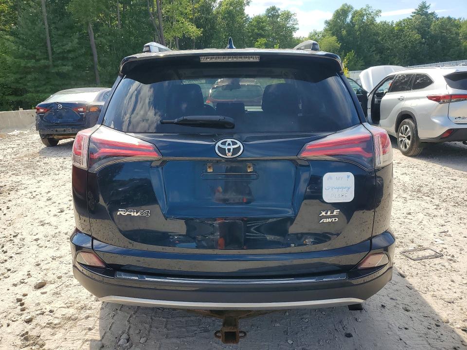Photo 6 from auction – 2018 TOYOTA RAV4 with VIN JTMRFREV3JJ198096