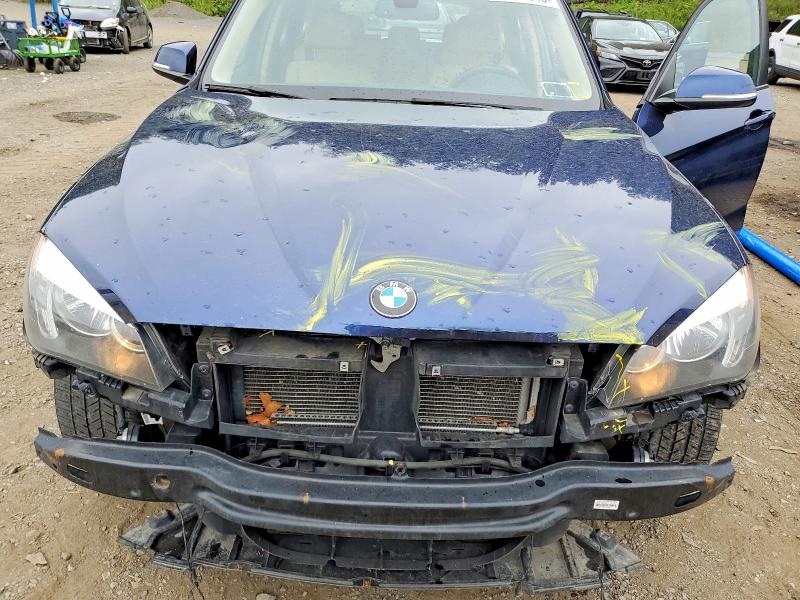 Photo 12 from auction – 2015 BMW X1 with VIN WBAVL1C52FVY40445