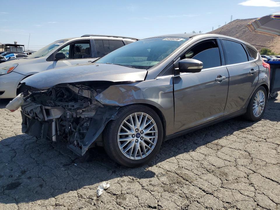 FORD FOCUS 2014 with VIN 1FADP3N23EL294269 - Photo from auction