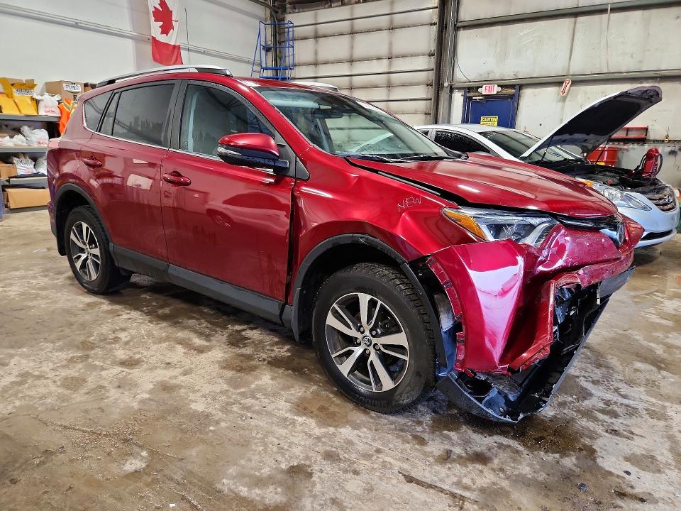 Photo 4 from auction – 2018 TOYOTA RAV4 with VIN 2T3BFREV3JW853229