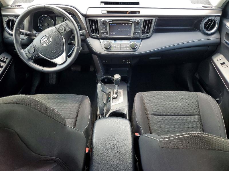 Photo 8 from auction – 2016 TOYOTA RAV4 with VIN JTMRFREV0GJ054465