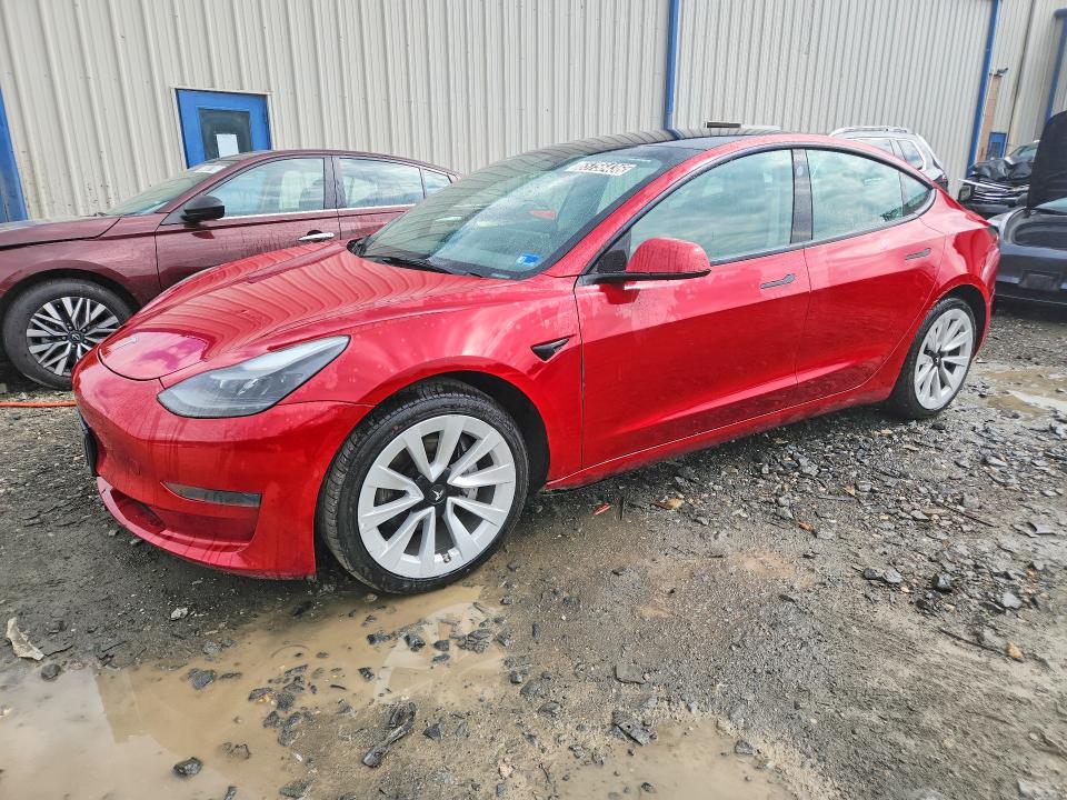 TESLA MODEL 3 2022 with VIN 5YJ3E1EA9NF285621 - Photo from auction