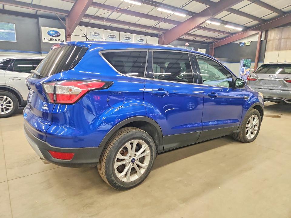 Photo 3 from auction – 2017 FORD ESCAPE with VIN 1FMCU9GD9HUD99053
