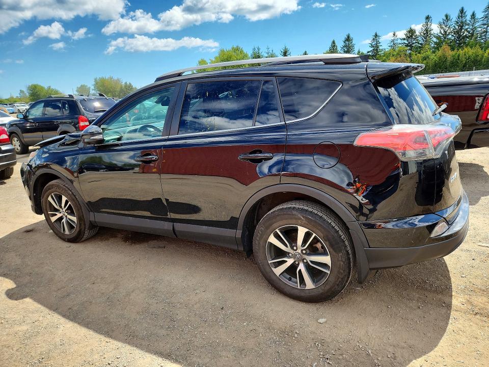 Photo 2 from auction – 2018 TOYOTA RAV4 with VIN 2T3BFREV6JW790479