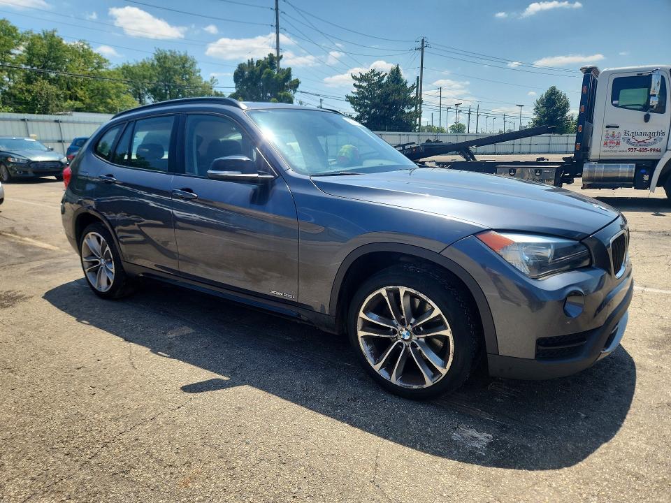 Photo 4 from auction – 2014 BMW X1 with VIN WBAVL1C59EVY20854